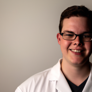 a professional and visually appealing image of a young happy smiling caucasian doctor with white teeth 740 300x300