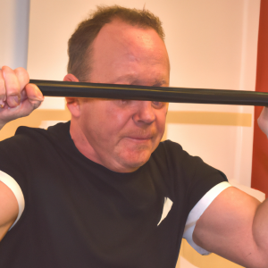 a professional appealing image of a caucasian man or woman exercising in a gym