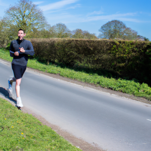 a professional appealing image of a caucasian man or woman jogging on a sunny day