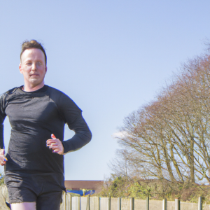 a professional appealing image of a caucasian man or woman jogging on a sunny day