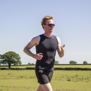 a professional appealing image of a caucasian man or woman jogging on a sunny day 689 300x300