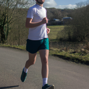 a professional appealing image of a caucasian man or woman jogging on a sunny day 725 300x300