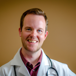 a professional and visually appealing image of a young happy smiling caucasian doctor with white teeth