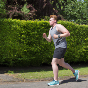 a professional appealing image of a caucasian man or woman jogging on a sunny day